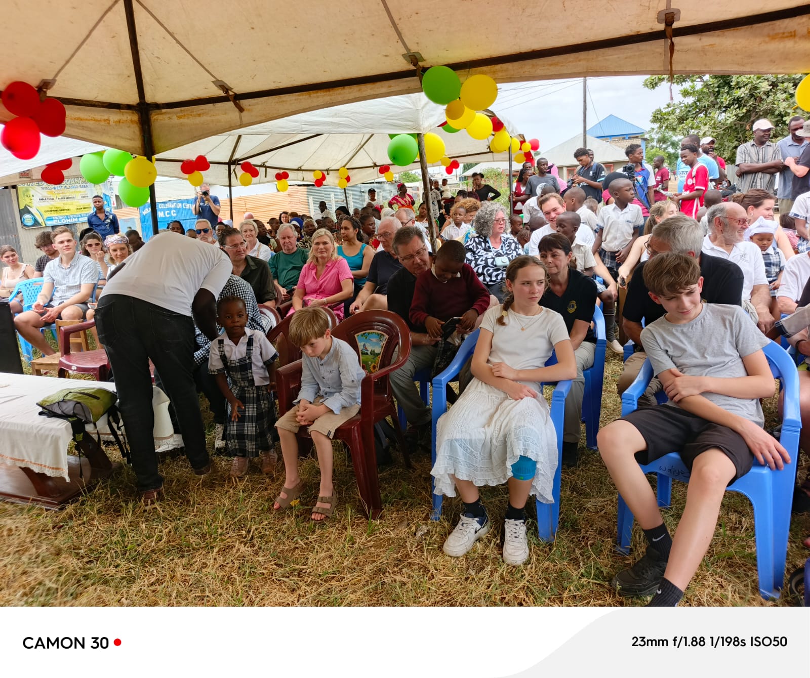 School launch ceremony in March 2025 — Fly and Help Foundation guests with Eagle Wings pupils